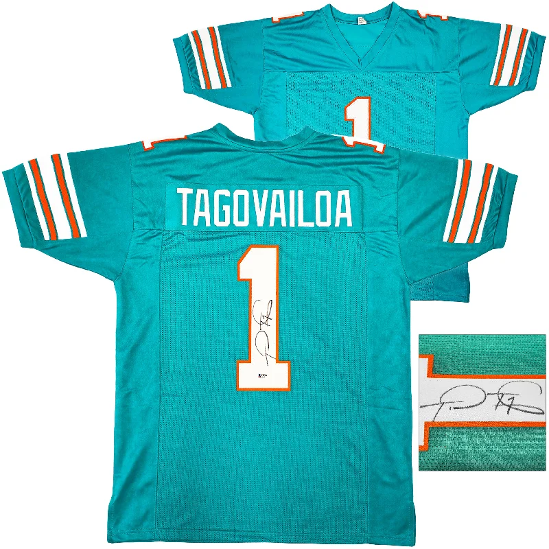 Miami Dolphins Tua Tagovailoa Autographed Teal Jersey Beckett BAS QR